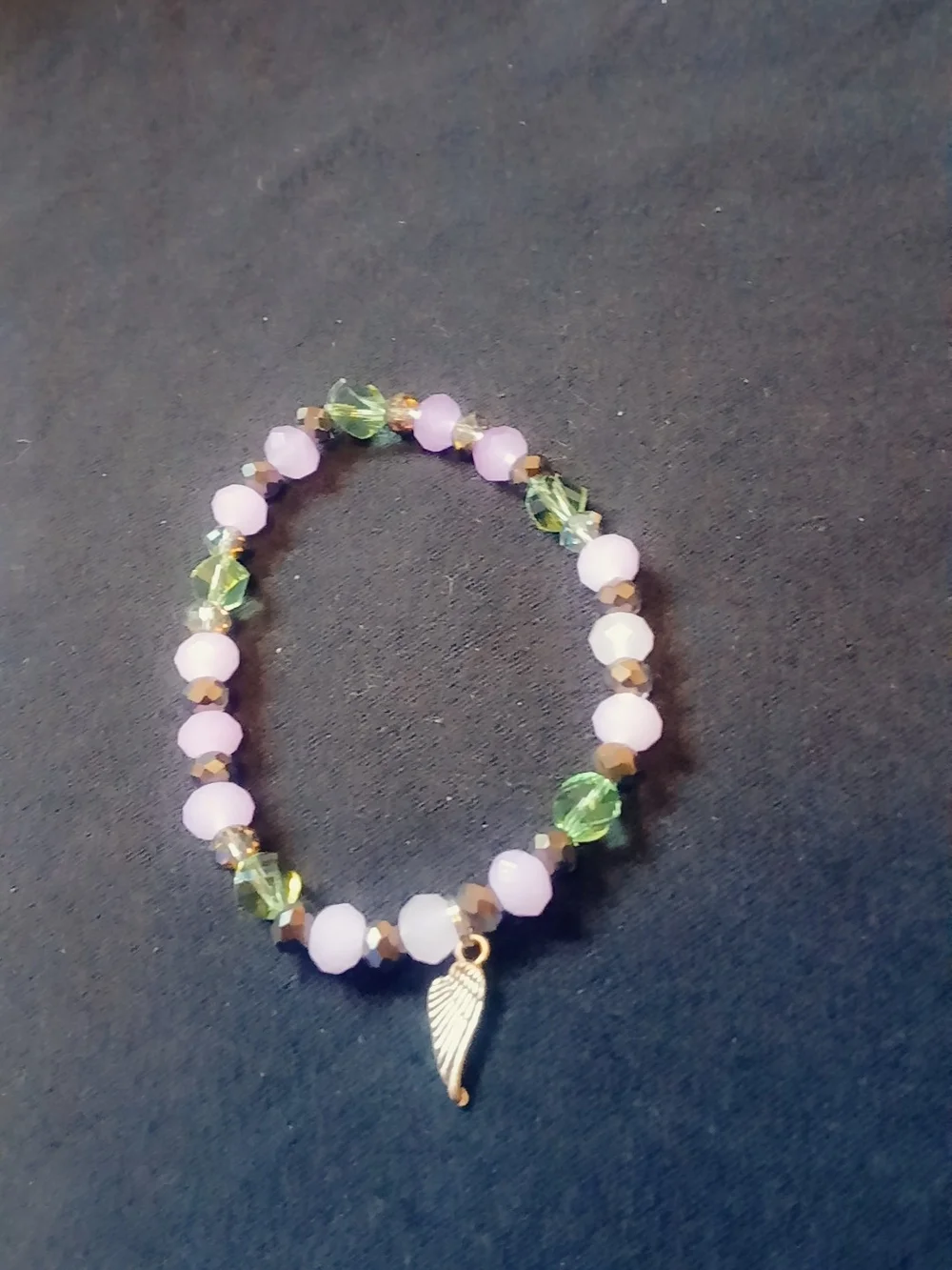 Purple and Green Beaded Stretch Bracelet with Silver Angel Wing Charm